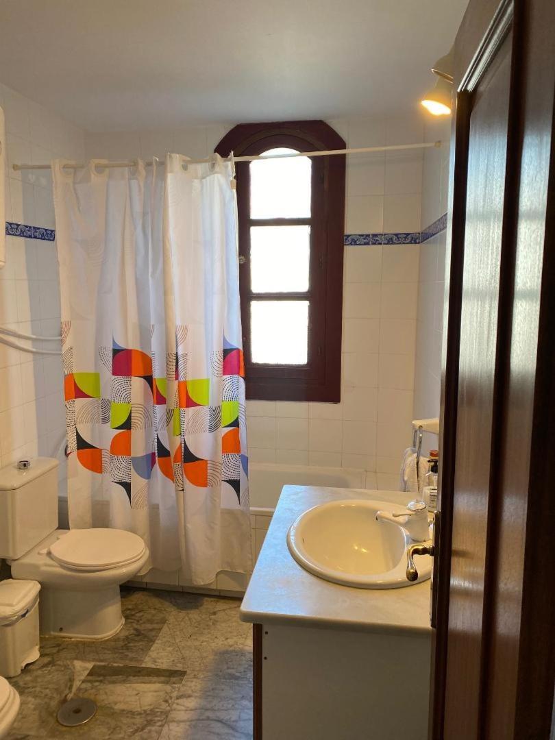 Casa-a-pequeno Conjunto Casas Adosados *
